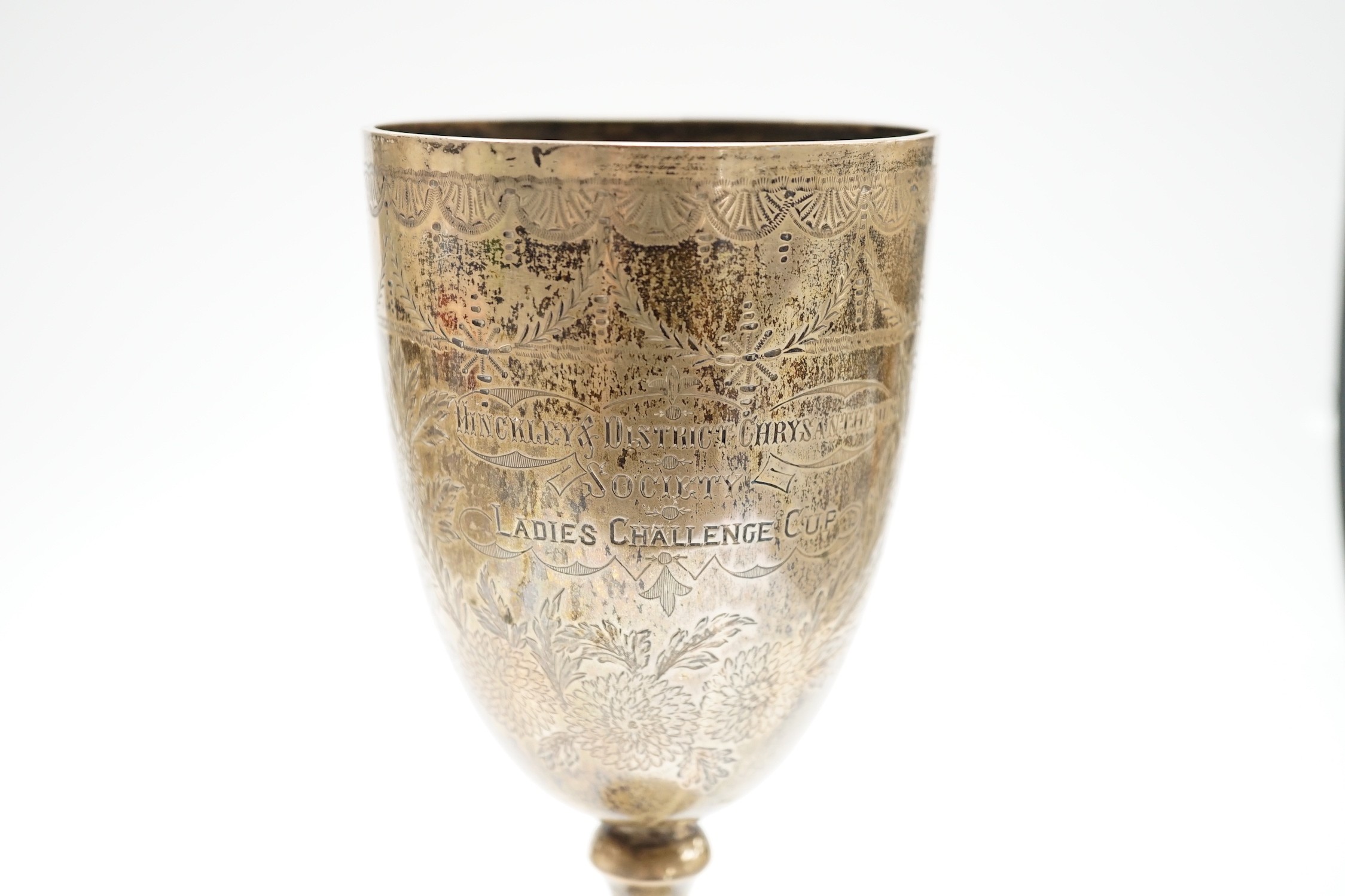 A late Victorian engraved silver presentation goblet, possible Charles Boyton, London, 1890, 23cm, 7.8oz.